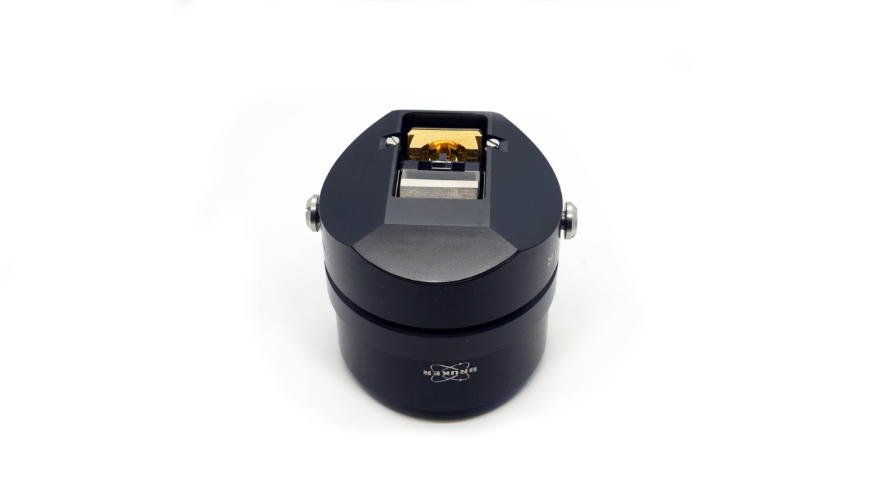 傅立叶变换红外光谱顕微鏡用対物レンズ。黒いボディと黄金の鏡。これは,入射測定の放牧角度に使用されます。